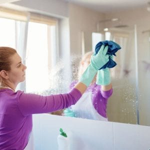 Women Cleaning Bathroom