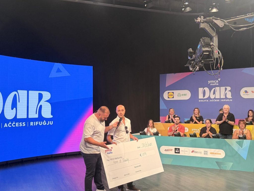 homes of quality alex paps donation to YMCA