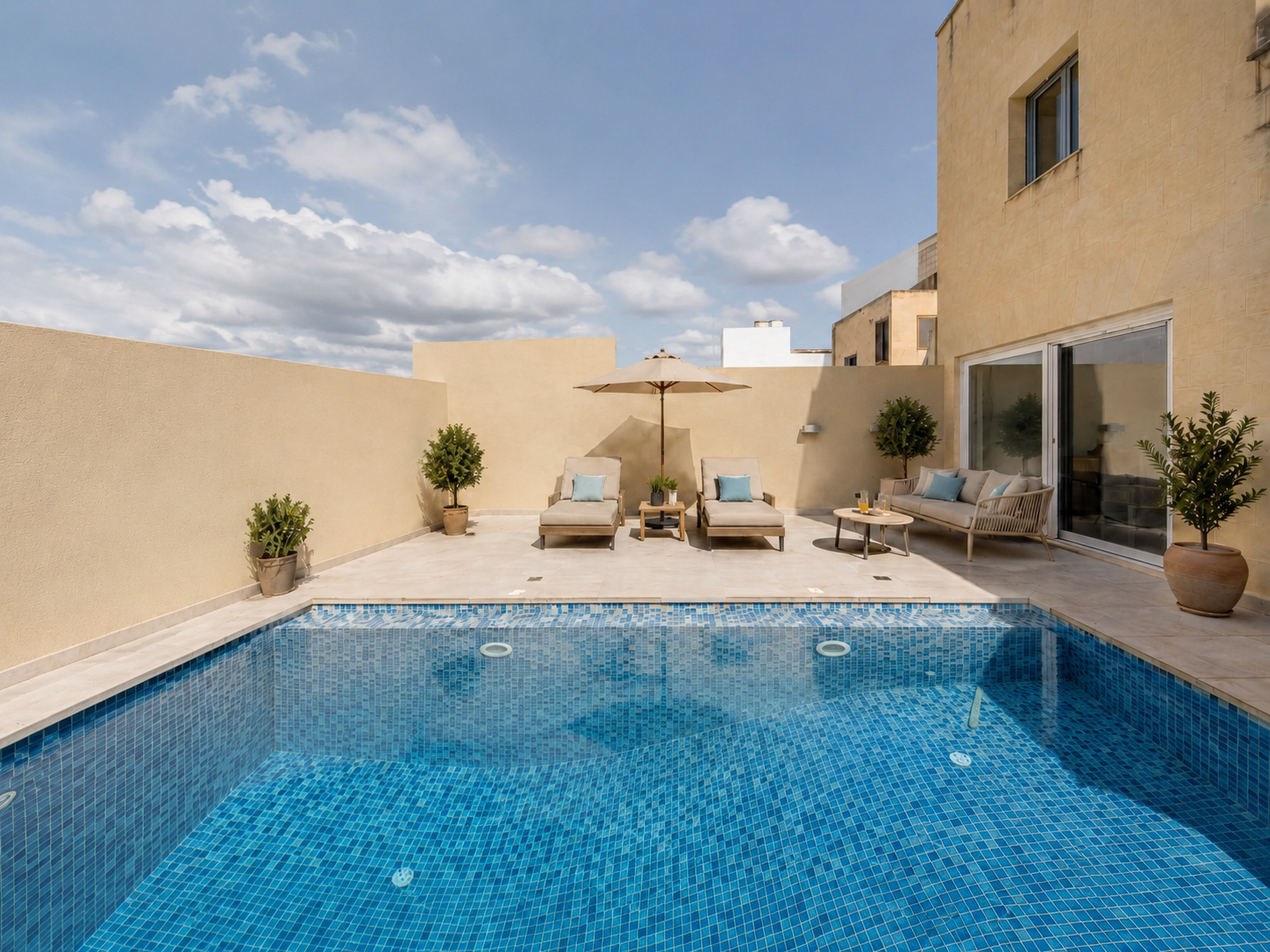 Private pool terrace at a holiday home in Malta