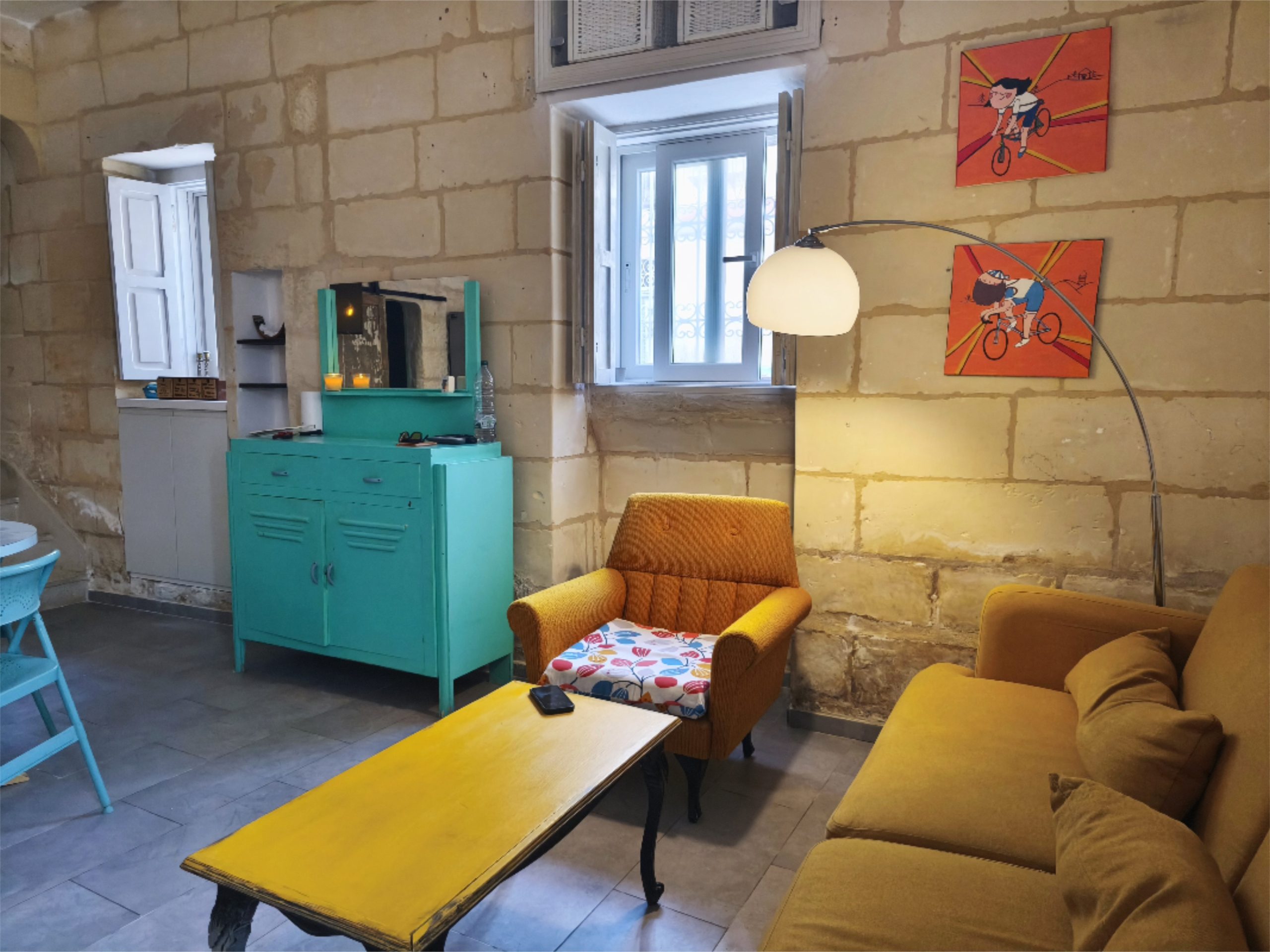 Restored Maltese townhouse kitchen and living area