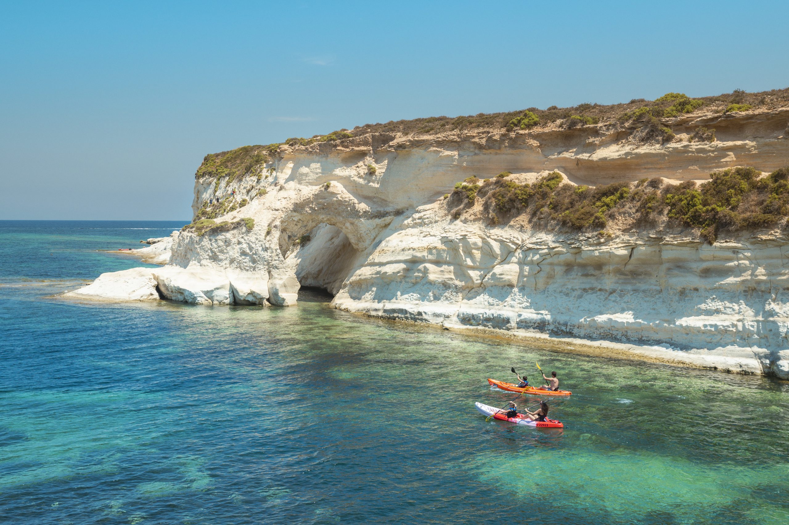 Kayaking along the white cliffs and clear waters of southern Malta