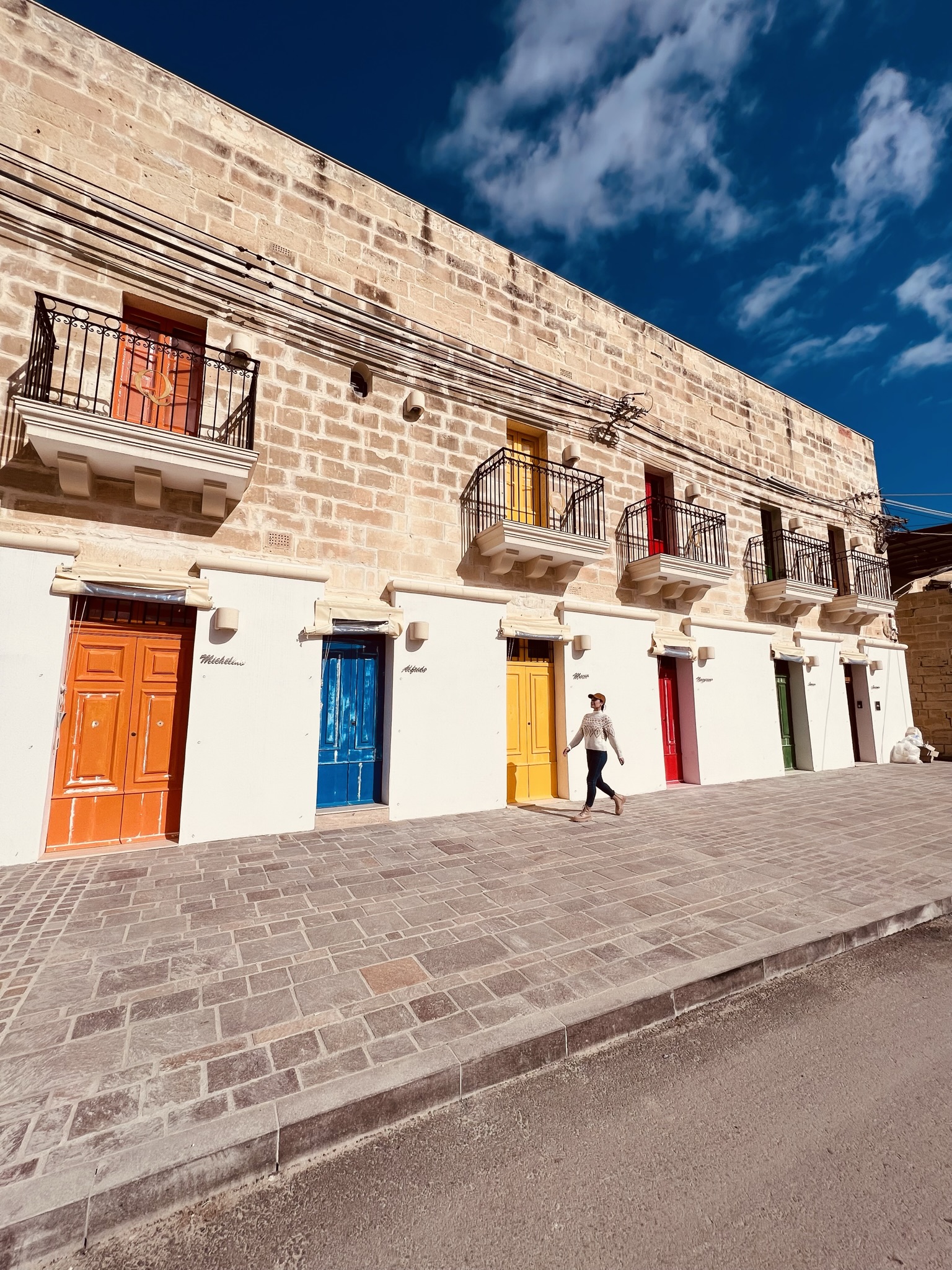 Traditional Maltese townhouses with colourful doors in the south of Malta